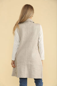 Sleeveless, open-front longline jacket with Notched lapel collar