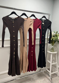 Ribbed knit dress with a sleek button-down front, fitted long sleeves, and a gently flared hem